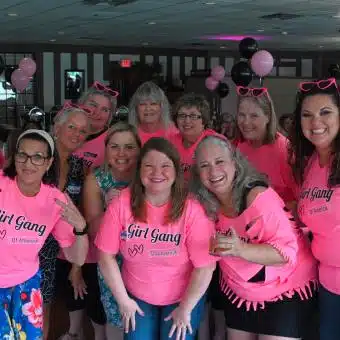 Cascades Manor Girl Gang Celebration Group of women celebrating at Cascades Manor, wearing pink "Girl Gang" shirts.